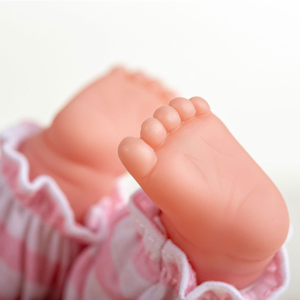 Berjusa doll clothing and shoes close-up showing embroidered outfit quality