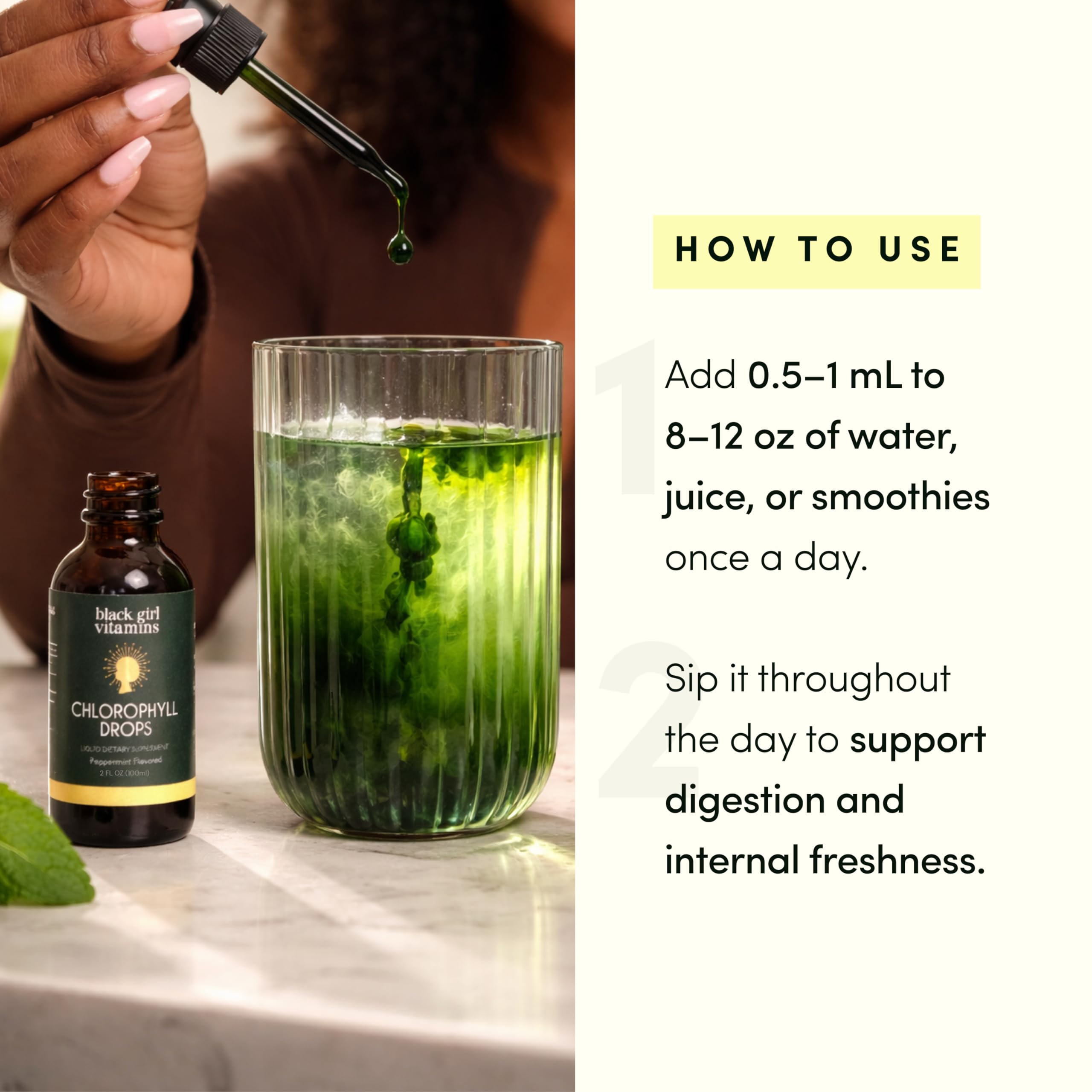 Black Girl Vitamins gotas vertidas en agua para una bebida refrescante