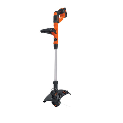 BLACK+DECKER recortadora junto a una regla para comparar tamaño y escala de la herramienta