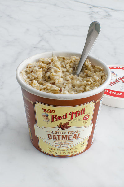 Bob's Red Mill cup beside spoon showing compact single-serve scale