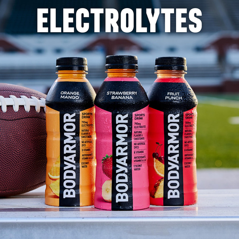 BODYARMOR botella de 16 oz en mano mostrando tamaño práctico