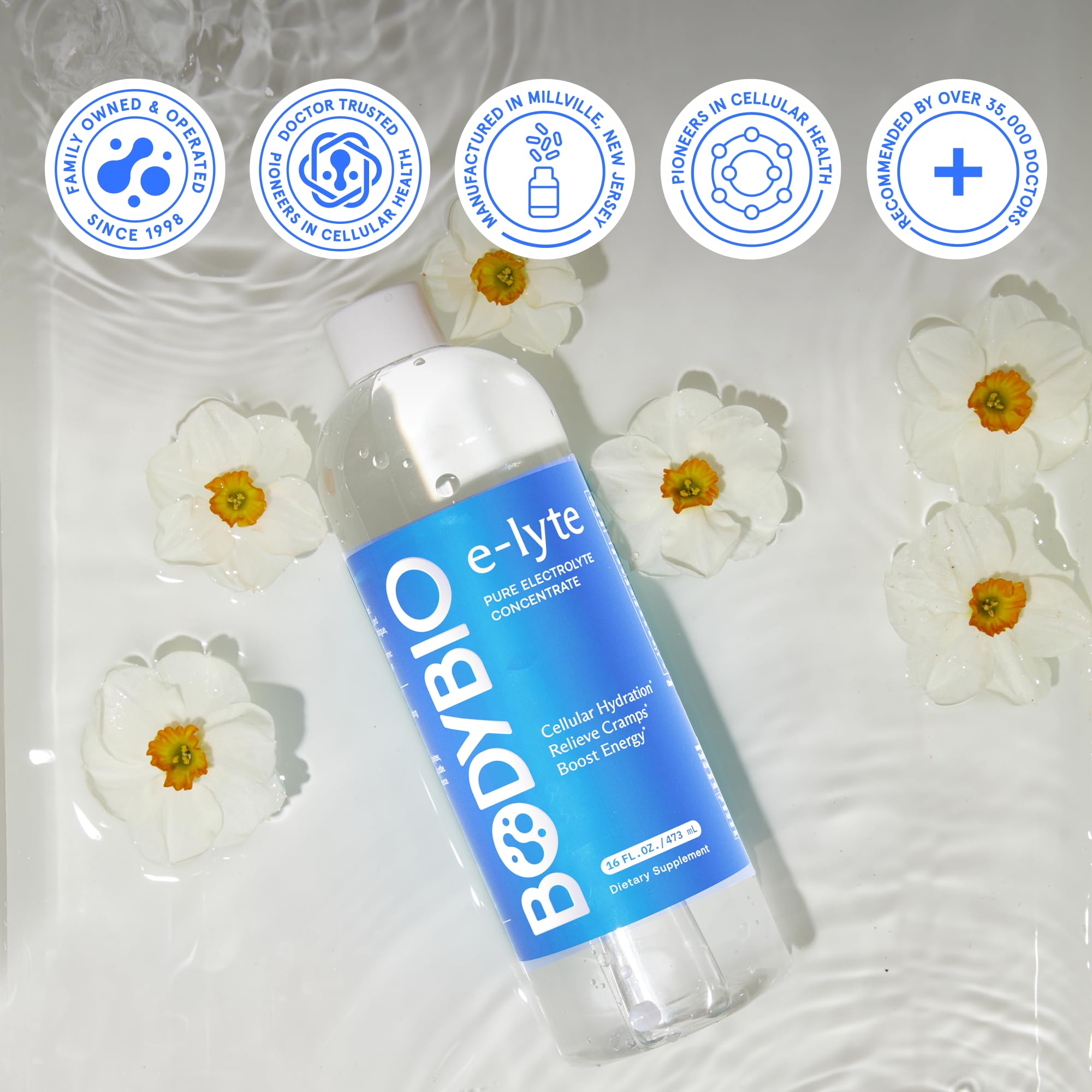 BodyBio e-Lyte bottle beside water bottle for convenient on-the-go hydration
