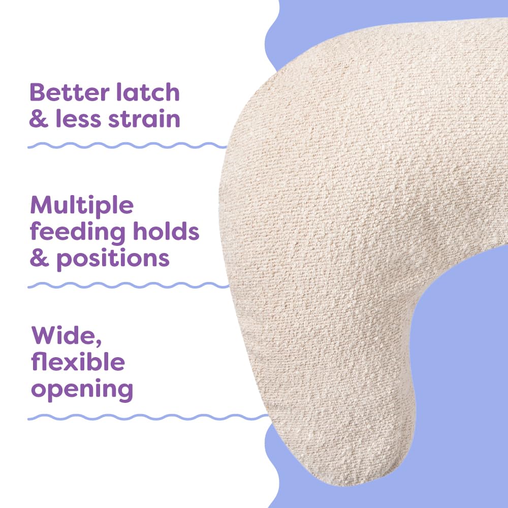 Boppy luxe demonstrating football hold for secure positioning and ease