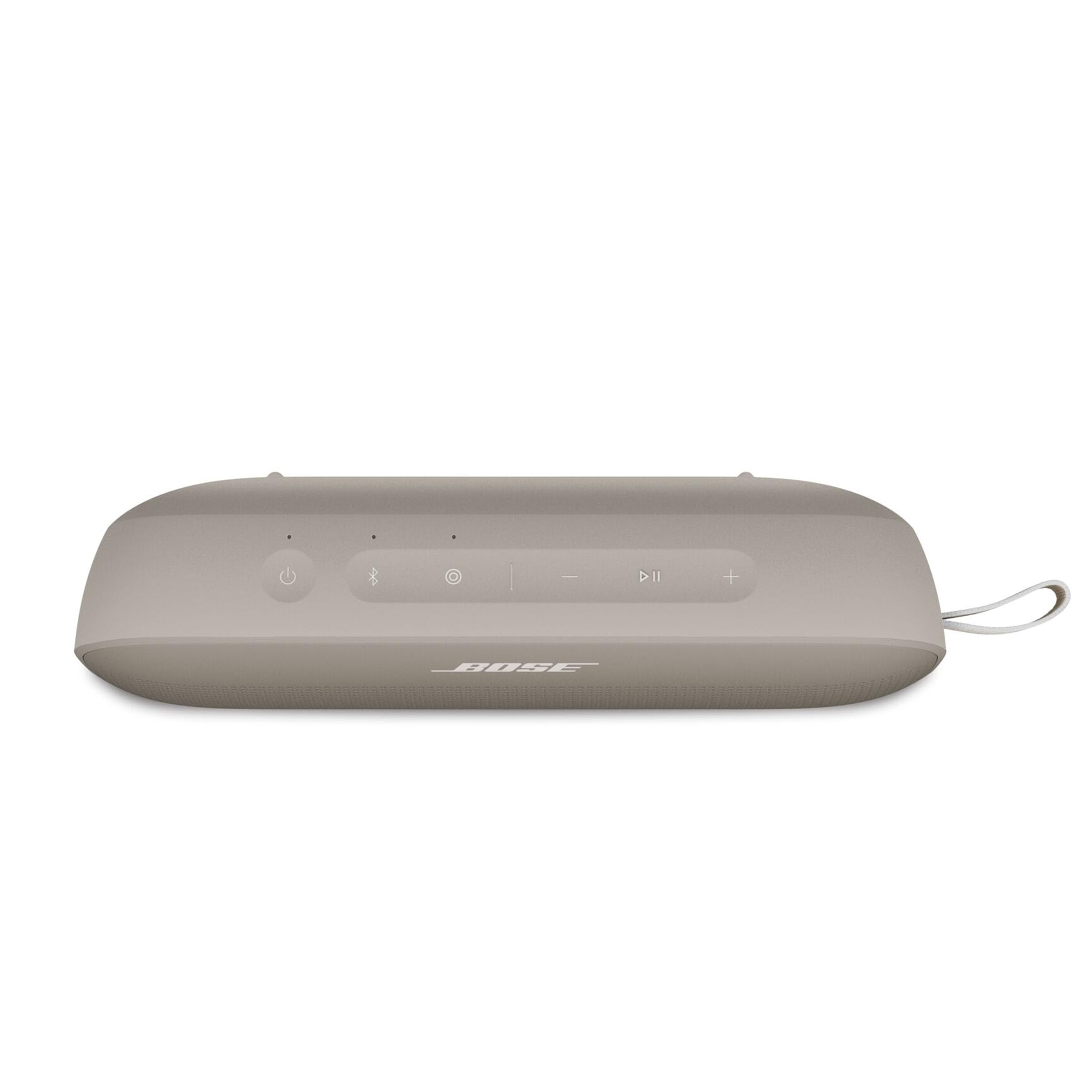 Bose SoundLink Flex hooked on backpack with secure utility loop