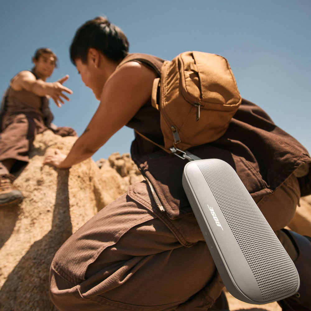 Bose SoundLink Flex held in hand showing compact portable size