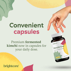 Brightcore Kimchi One envase abierto con cápsulas visibles, ideal para llevar y tomar diario