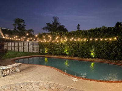 Brightech nighttime patio dining illuminated for entertaining