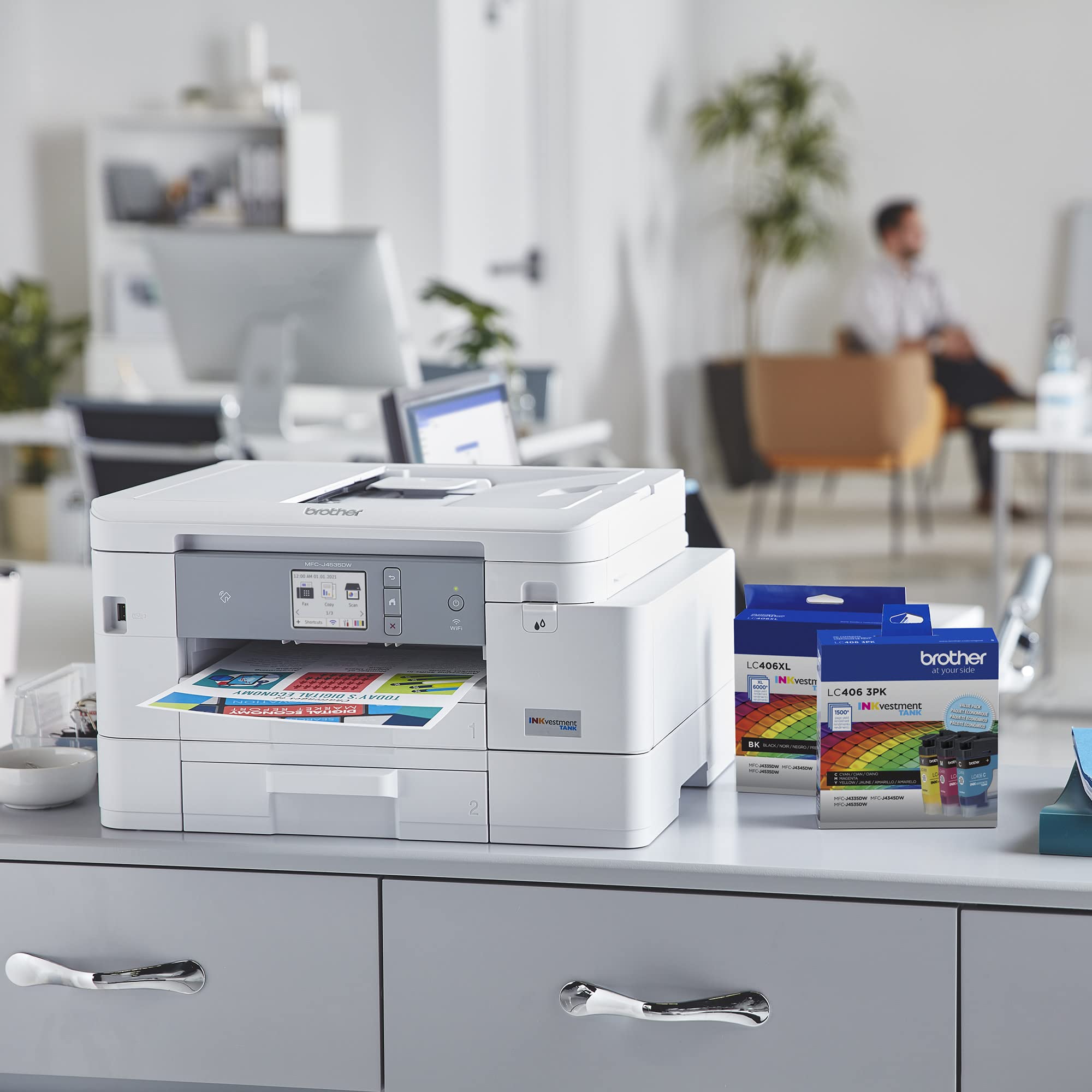 Brother LC406 cartridges lined up showing color identification for fast swaps