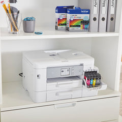Brother LC406 cartridge installed in Brother printer for quick front-loading benefit