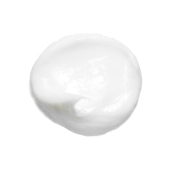 Bumble and bumble creamy texture swiped on hand displaying moisturizing slip