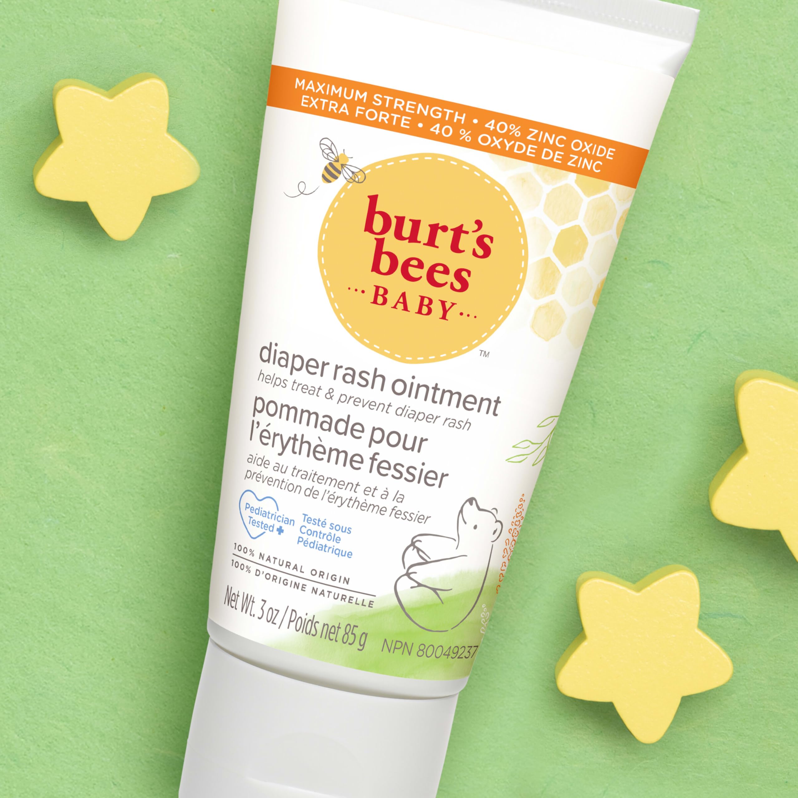 Burt's Bees pomada en cambiador indicando uso diario y conveniencia