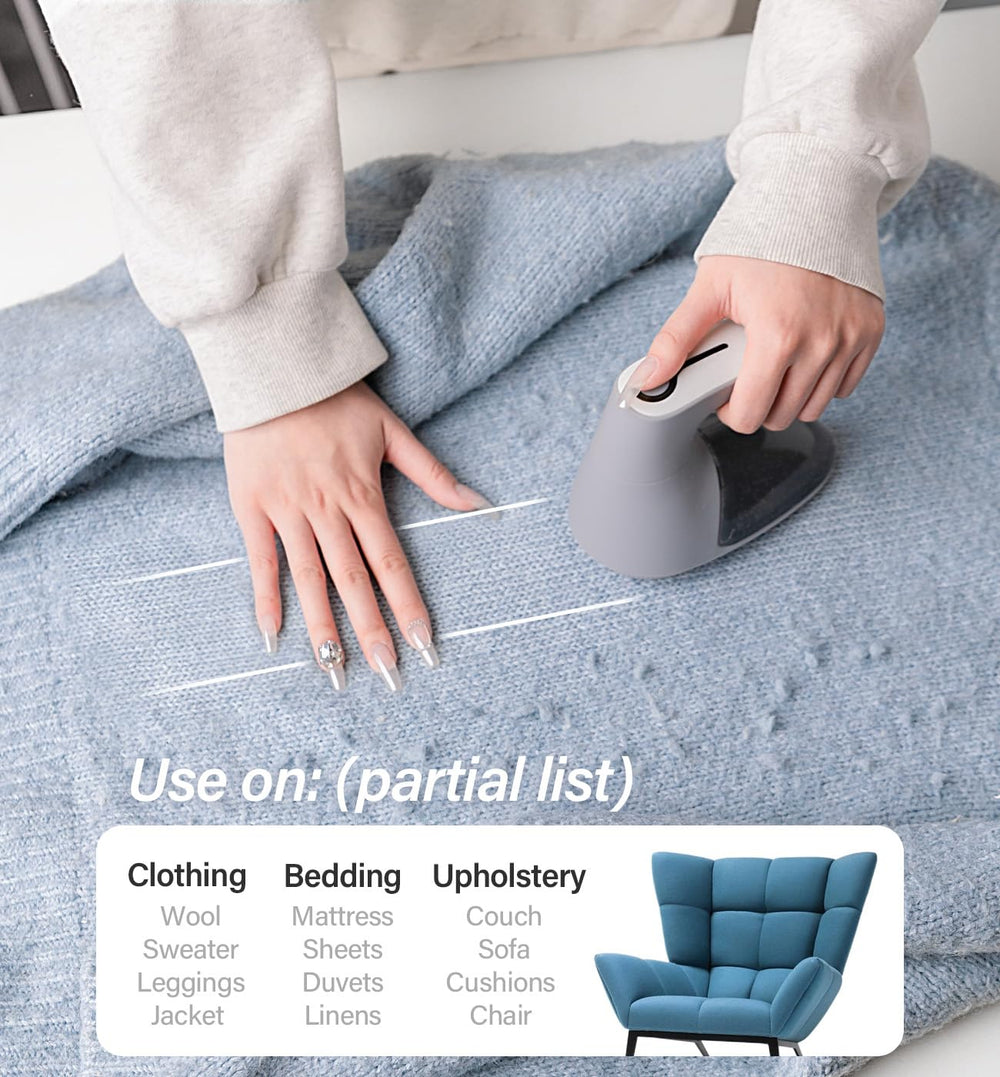 Bymore held in hand for size scale, demonstrating comfortable ergonomic grip