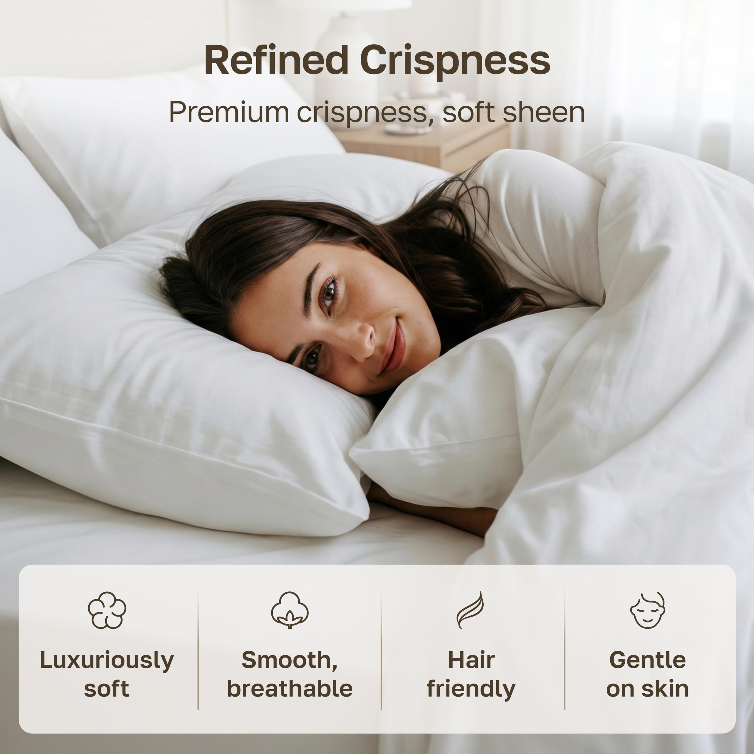 California Design Den folded pair on a made bed illustrating crisp hotel look