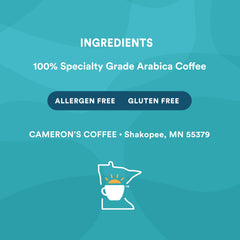 Cameron's Coffee bolsa de 32 onzas junto a una regla para escala