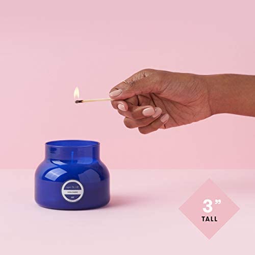 Capri Blue vela en mano para mostrar tamaño práctico y portable