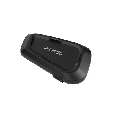 Cardo Spirit mounted inside helmet demonstrating secure fit and hands-free use
