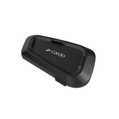 Cardo Spirit mounted inside helmet demonstrating secure fit and hands-free use