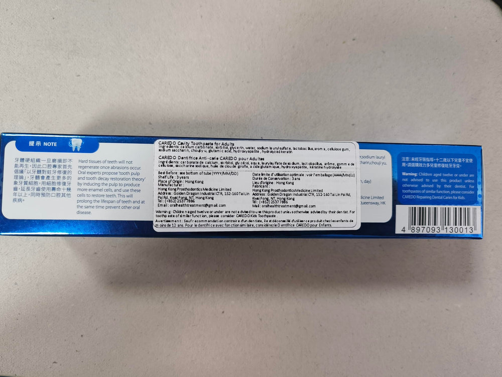 CAREDO primer plano sobre diente que ilustra depósito mineral reparador