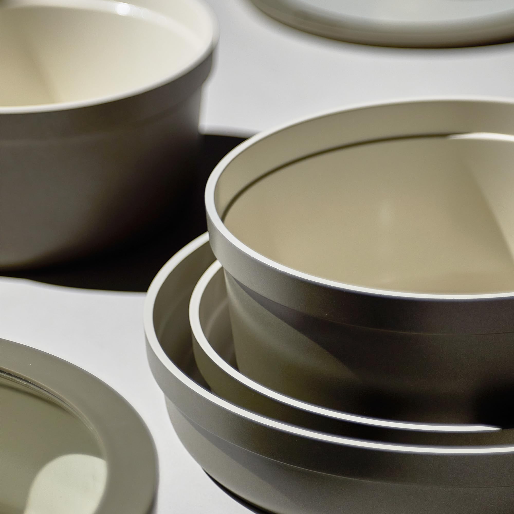 CAROTE utensils, trivets, and pan protectors arranged showing ready-to-cook benefit