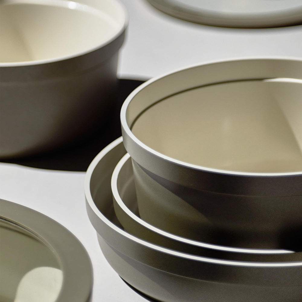CAROTE utensils, trivets, and pan protectors arranged showing ready-to-cook benefit