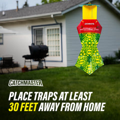 Catchmaster assembled trap hanging in garden protecting plants