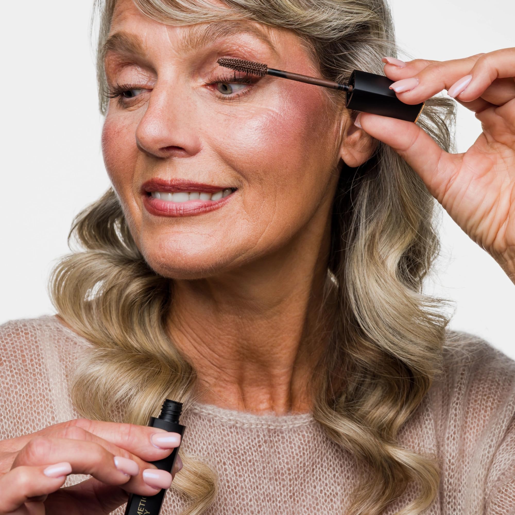 Cellmetics Mascara on mature woman showing natural fuller lashes and confidence benefit