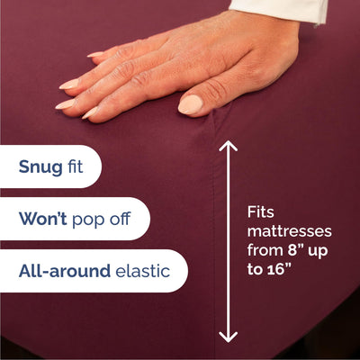 CGK Unlimited flat sheet fully spread on bed showing coverage and tuck-in room benefit