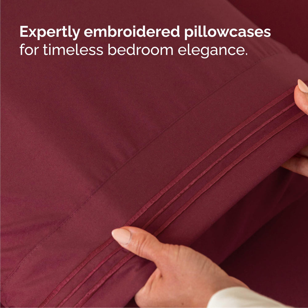 CGK Unlimited sheets on queen mattress illustrating fit on up to 16 inch depth for secure hold
