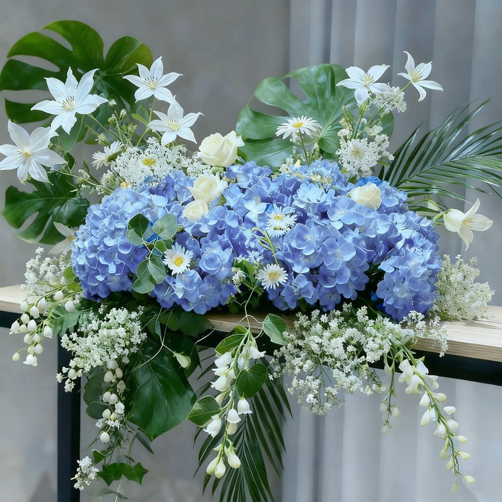 Cherica arranged hydrangeas in a vase delivering instant, maintenance-free centerpieces