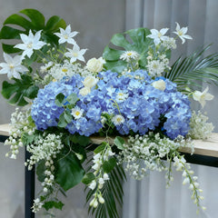 Cherica arranged hydrangeas in a vase delivering instant, maintenance-free centerpieces