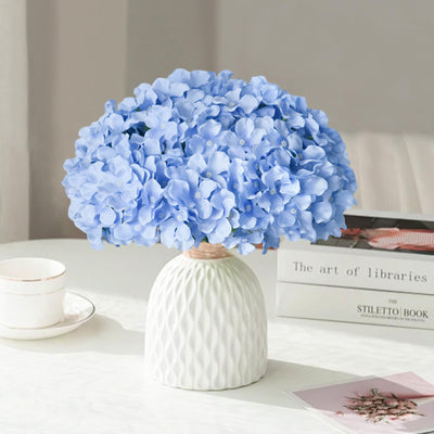Cherica bouquet of blue hydrangeas demonstrating easy DIY floral arrangements