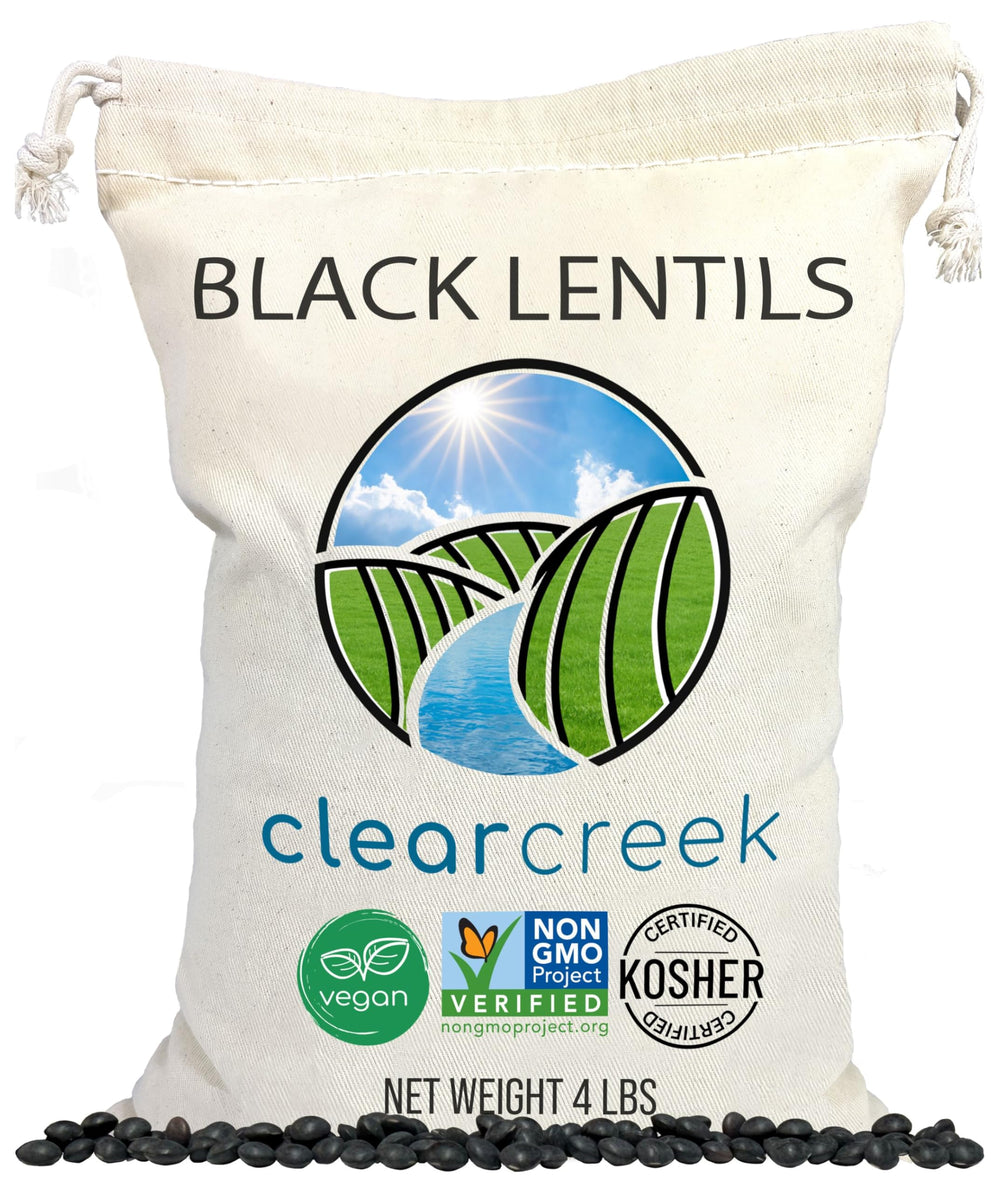 CLEAR CREEK empaque frontal de 4 lb que muestra lentejas negras y beneficios nutricionales