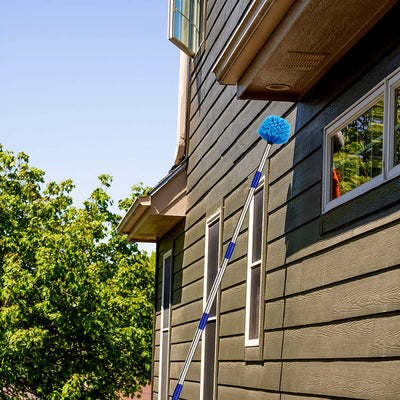 COCONUT duster beside ladder for scale showing safe ladder-free reach