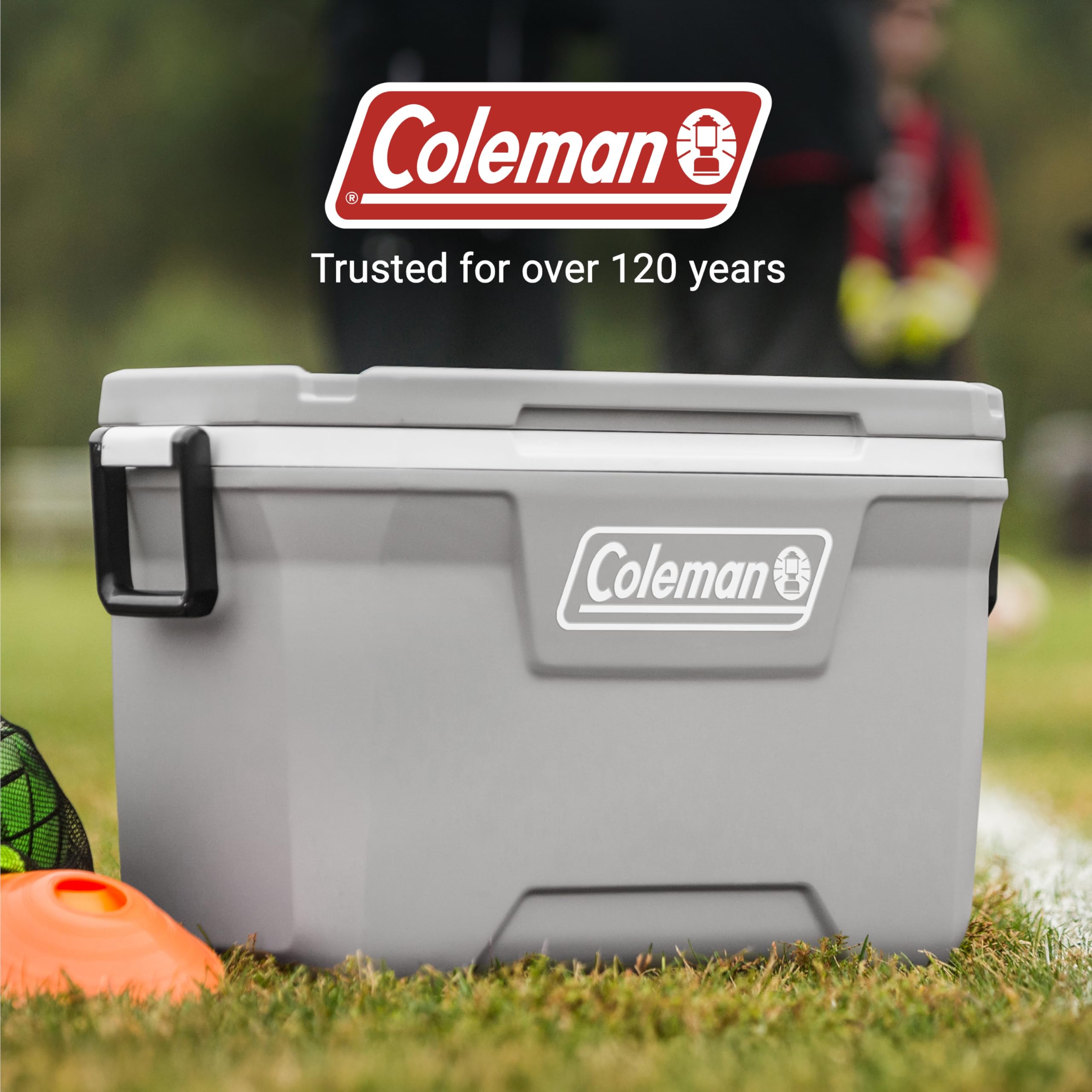 Coleman cooler on a beach showing portability and outdoor convenience benefit