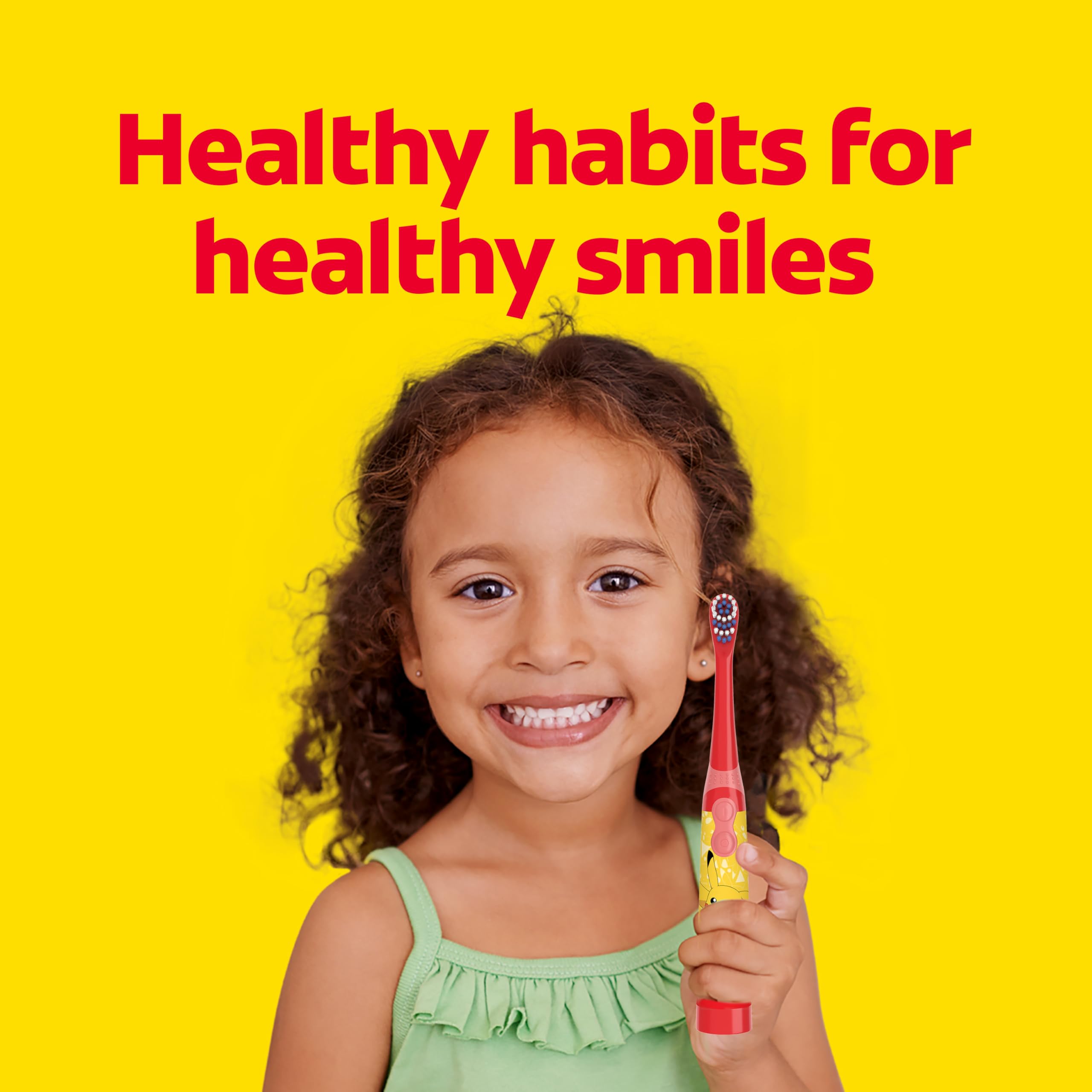 Colgate Pokemon manos de niño cepillando motivado por diseño divertido