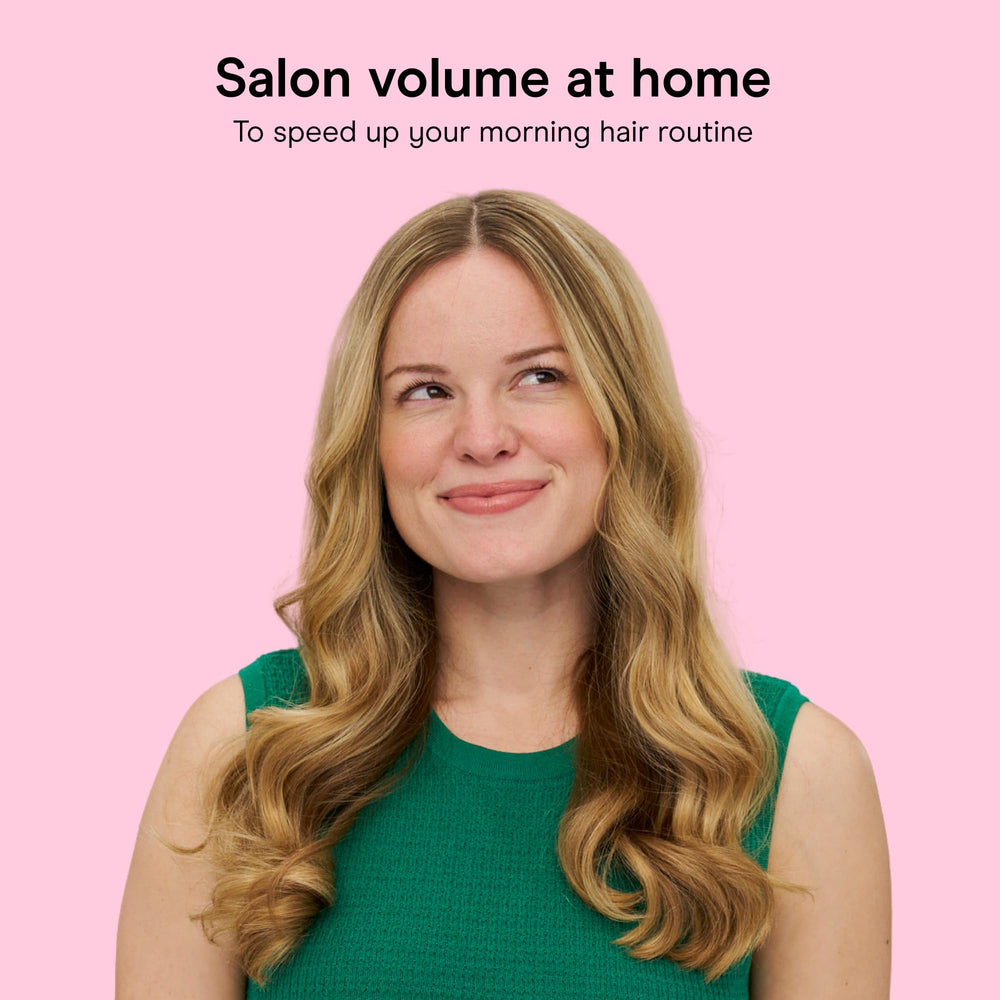 Conair rollers heating base lit to indicate 85-second ready time benefit