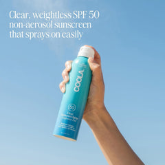 COOLA spray nozzle close-up highlighting easy, even application benefit