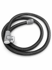 COSTAPARTAY tubo instalado junto a cama para uso cómodo y ordenado junto a mesa