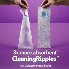 Cottonelle rollo desplegado mostrando grosor y absorción