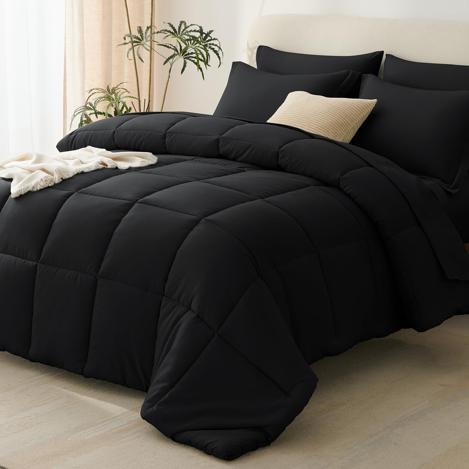 CozyLux edredón frontal negro mostrando cobertura completa y aspecto moderno