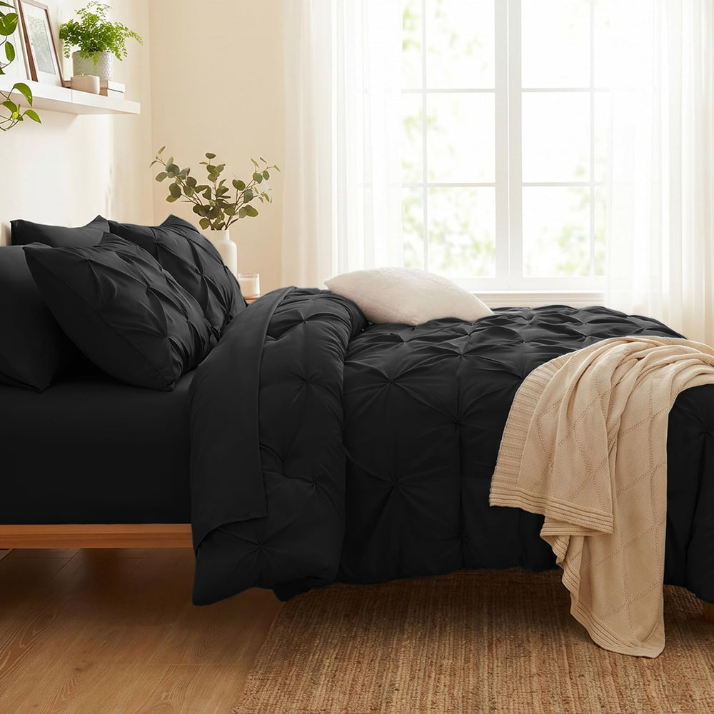 CozyLux measuring tape next to comforter demonstrating true queen sizing fit