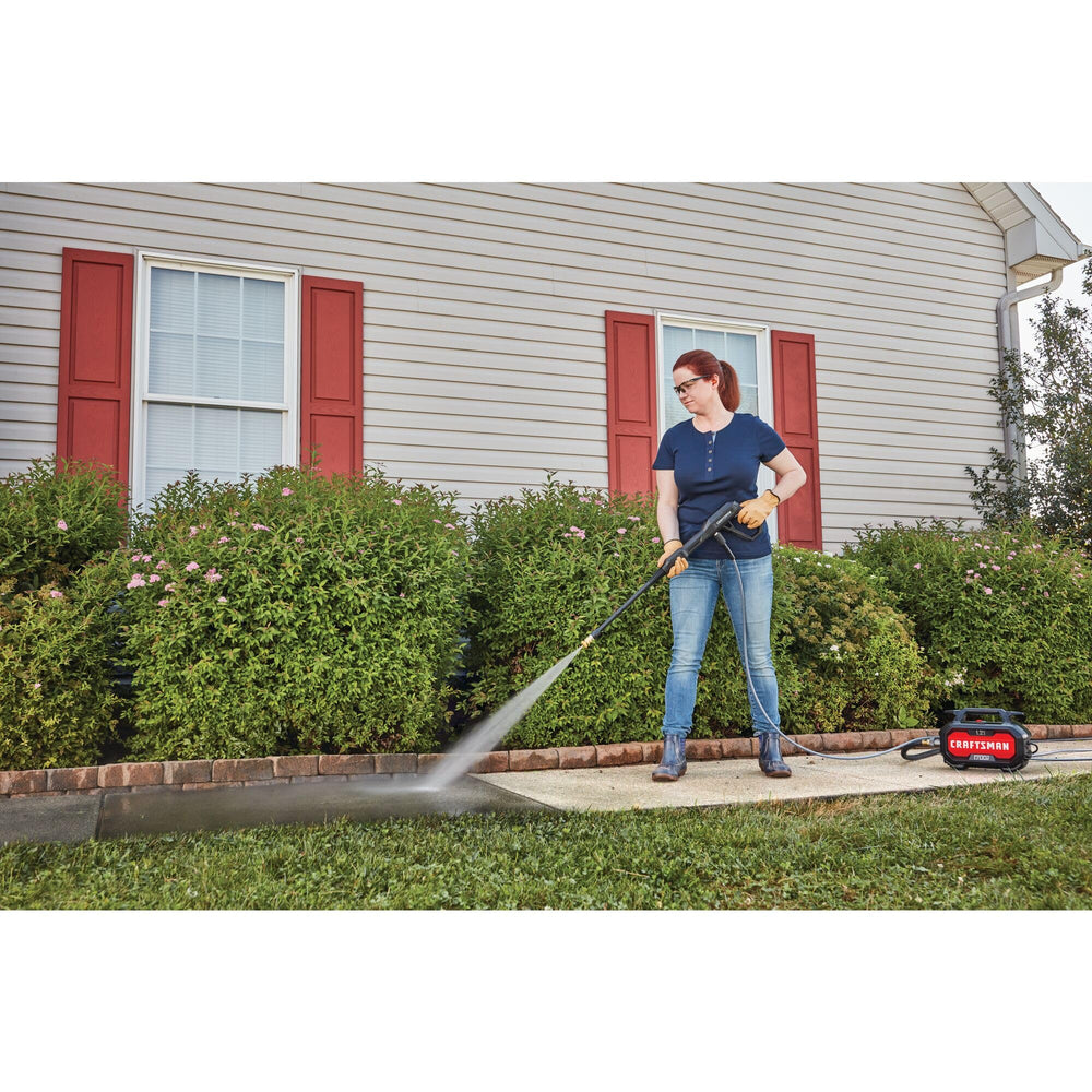 CRAFTSMAN in use on driveway demonstrating effective stain and dirt removal
