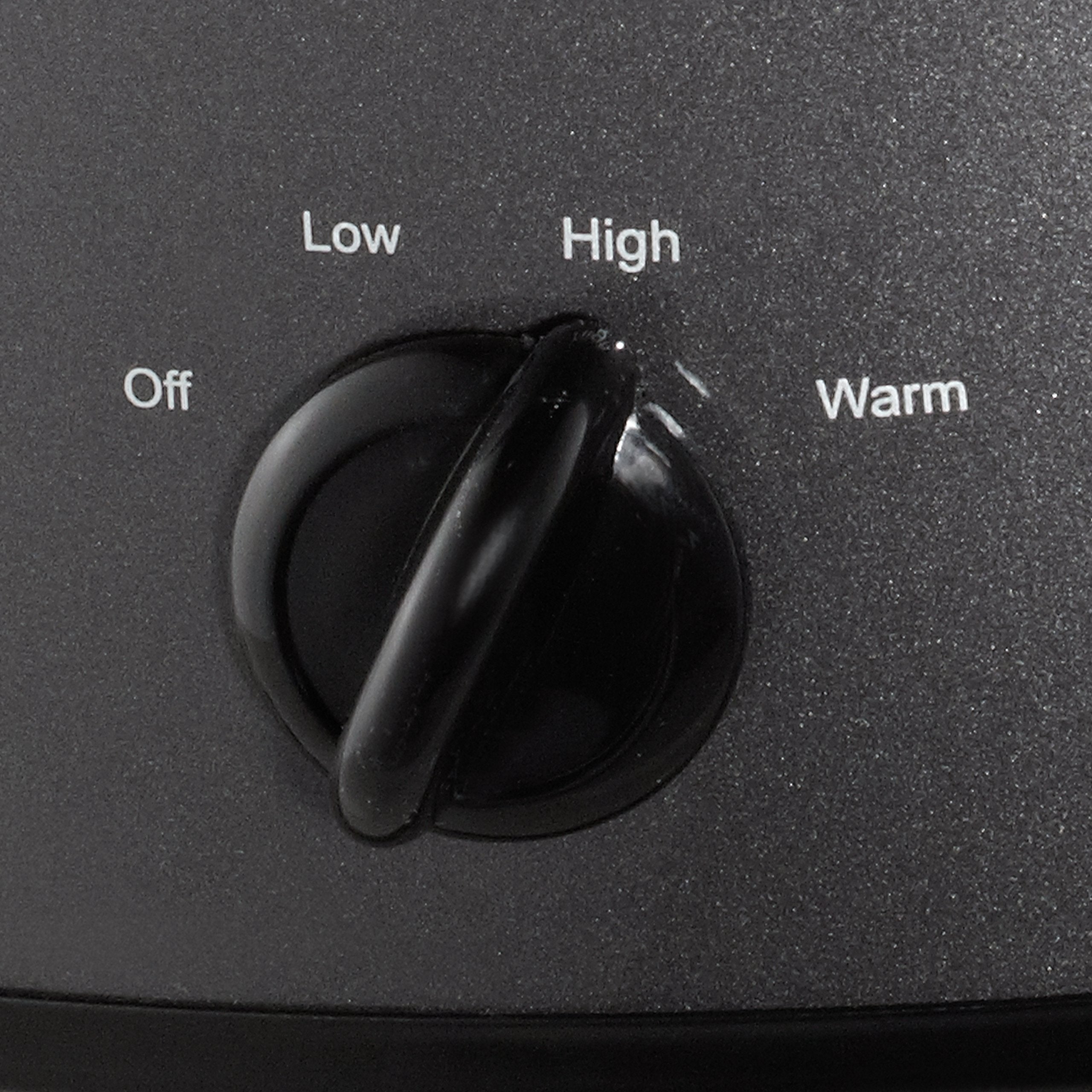 Crock-Pot junto a utensilios para comparar tamaño y porciones familiares