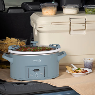 Crock‑Pot interior with a roast showing 7‑quart capacity feeding a large group
