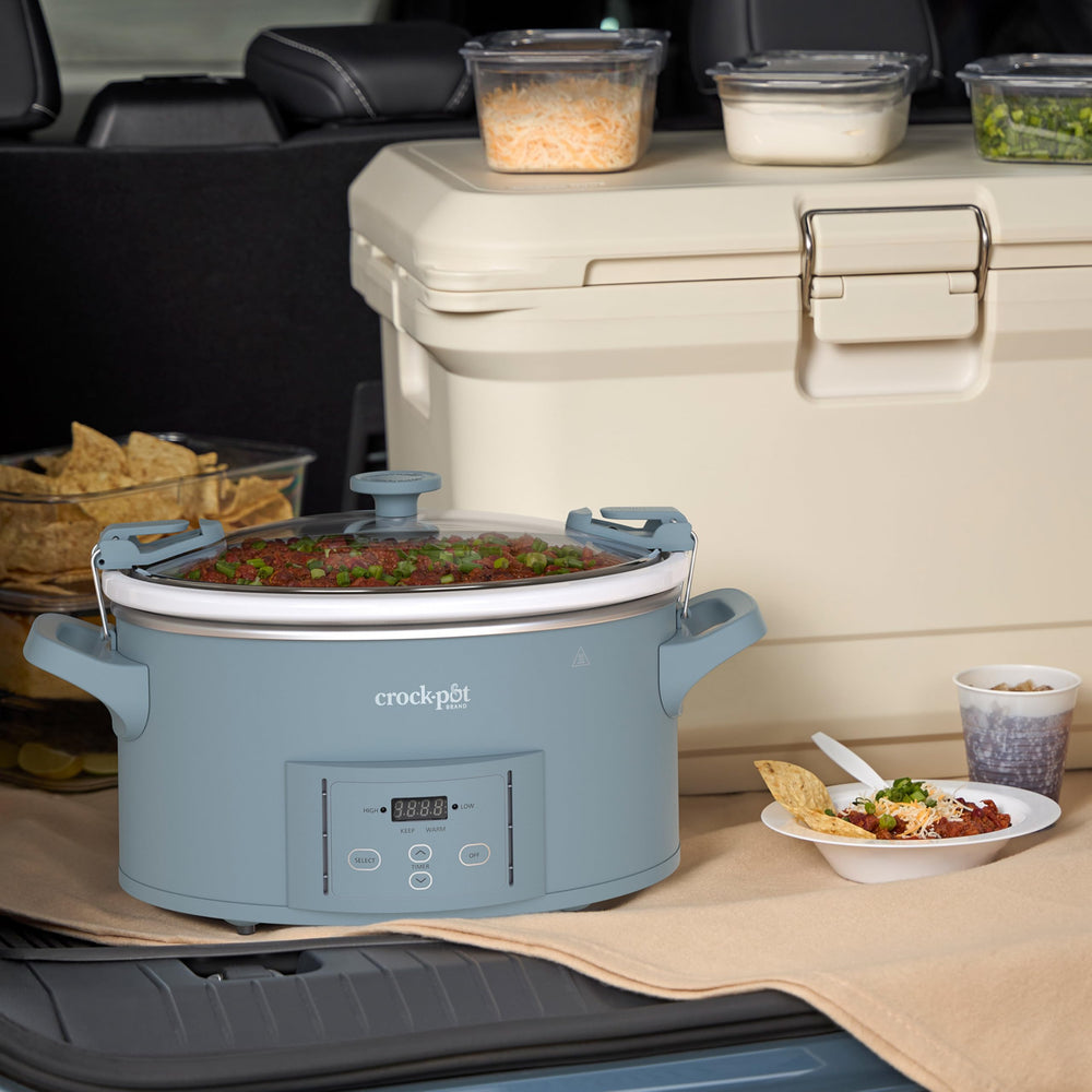 Crock‑Pot interior with a roast showing 7‑quart capacity feeding a large group