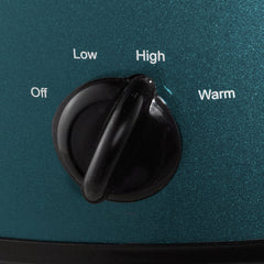 Crock-Pot beside serving bowl showing 7-quart scale for meal prep convenience