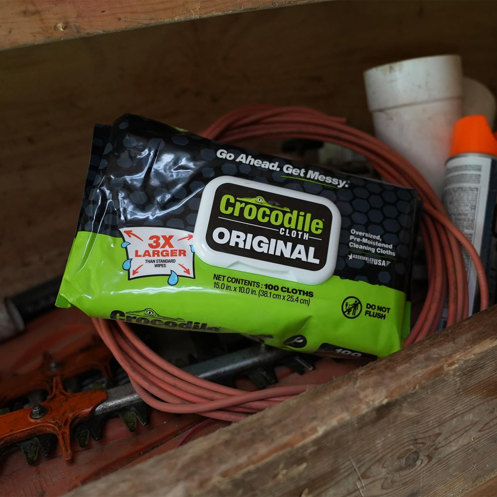 Crocodile Cloth used in a garage lifestyle shot showing rugged, on-the-job cleaning performance