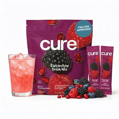 Cure Hydration paquete frontal Berry Pomegranate mostrando 14 sobres beneficios hidratación rápida