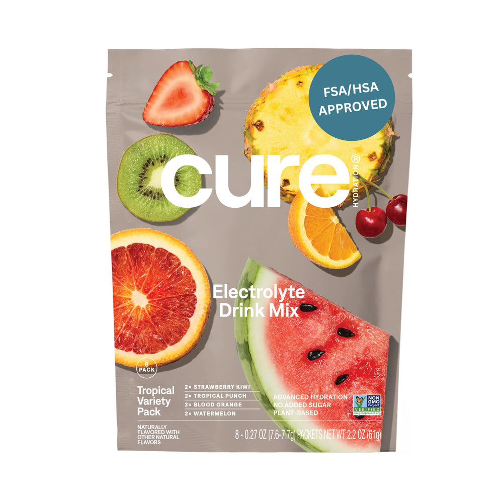 Cure Hydration paquete tropical frente mostrando sobres y marca, práctico para llevar