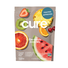 Cure Hydration paquete tropical frente mostrando sobres y marca, práctico para llevar